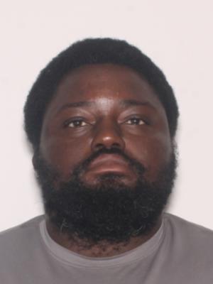 REGINALD J WOODS
