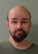 ADAM TUCKER DRIGGERS