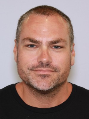 MACKENZIE DENNIS THOMA